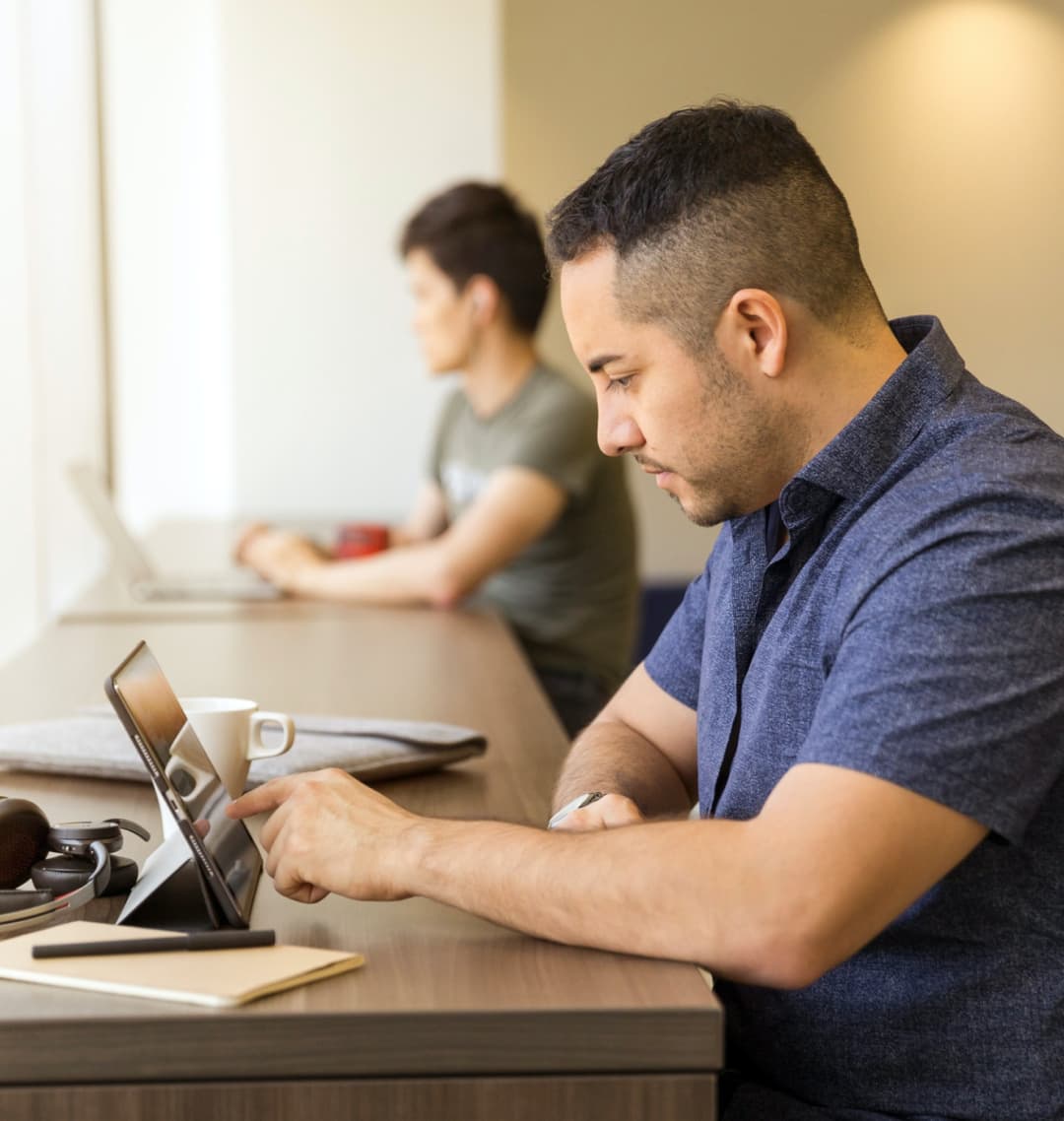 Man using a tablet device